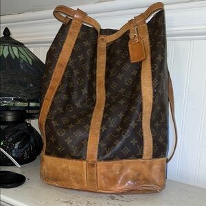 Louis Vuitton Authentic Randonnee PM Monogram Hobo Backpack Bag
